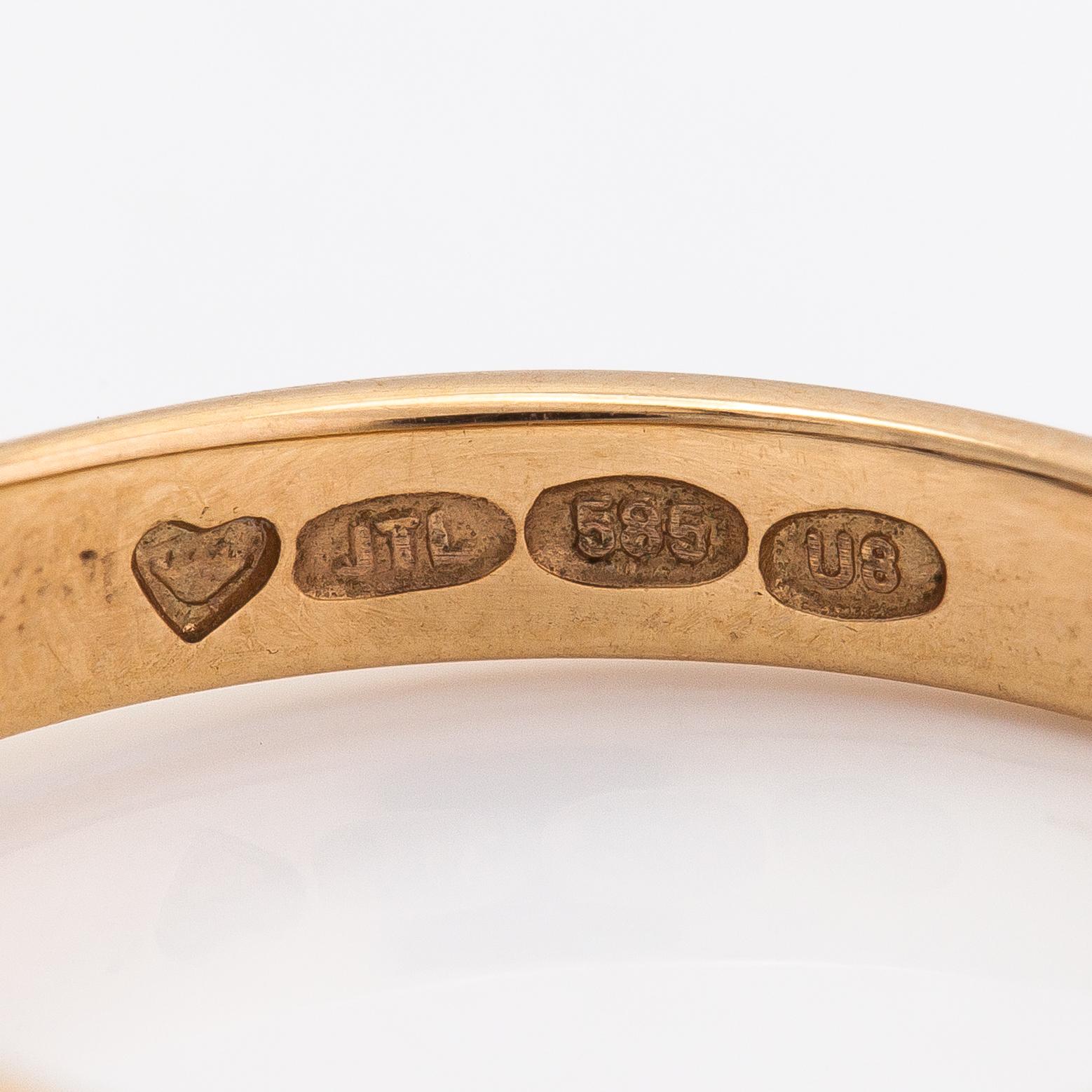 A 14K gold ring with diamonds ca. 0.21 ct in total. Finland 1997.