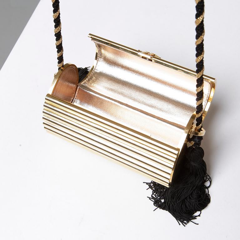 AFTONVÄSKA, "Gold Tassel Clutch", Yves Saint Laurent.