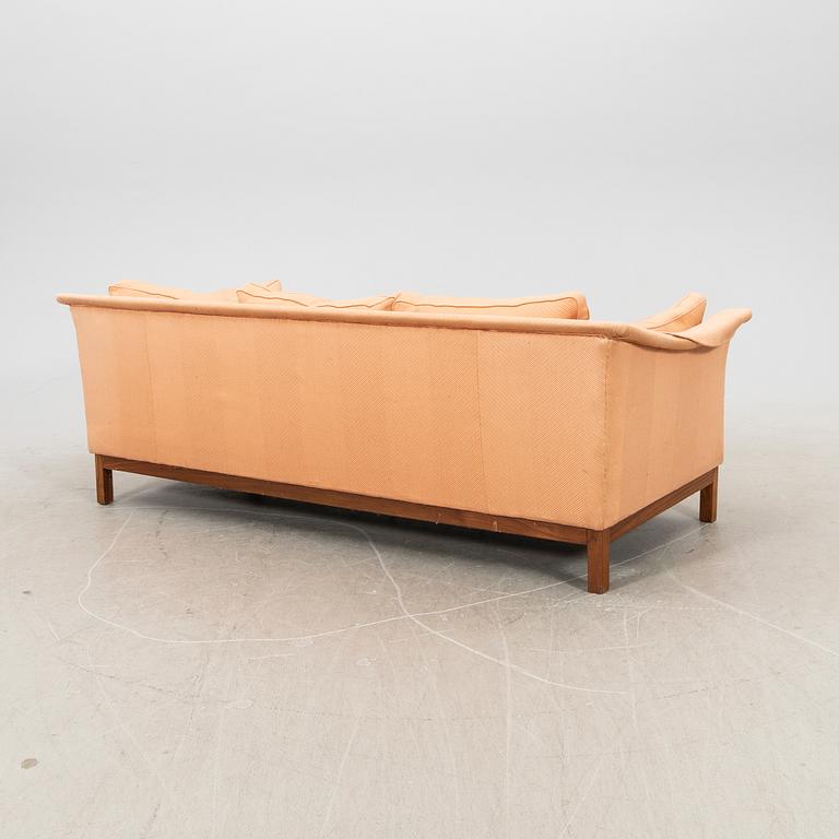 A 20th century three-seater sofa.