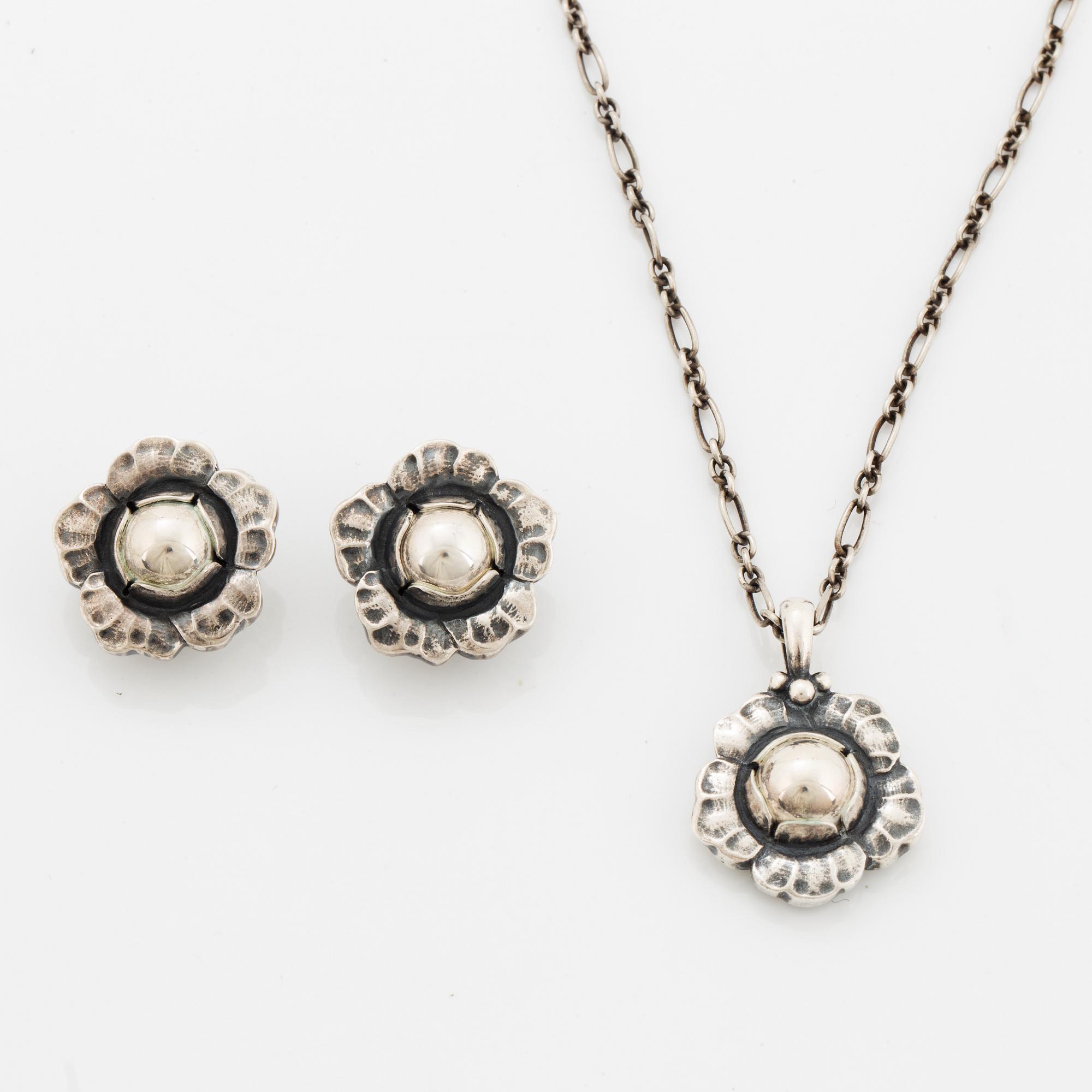 Georg Jensen Heritage silver a pair of earrings and a necklace.