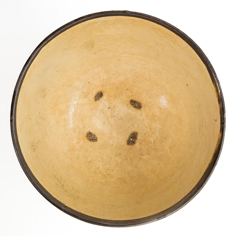 A creme glazed bowl, presumably Song/Yuan dynasty.
