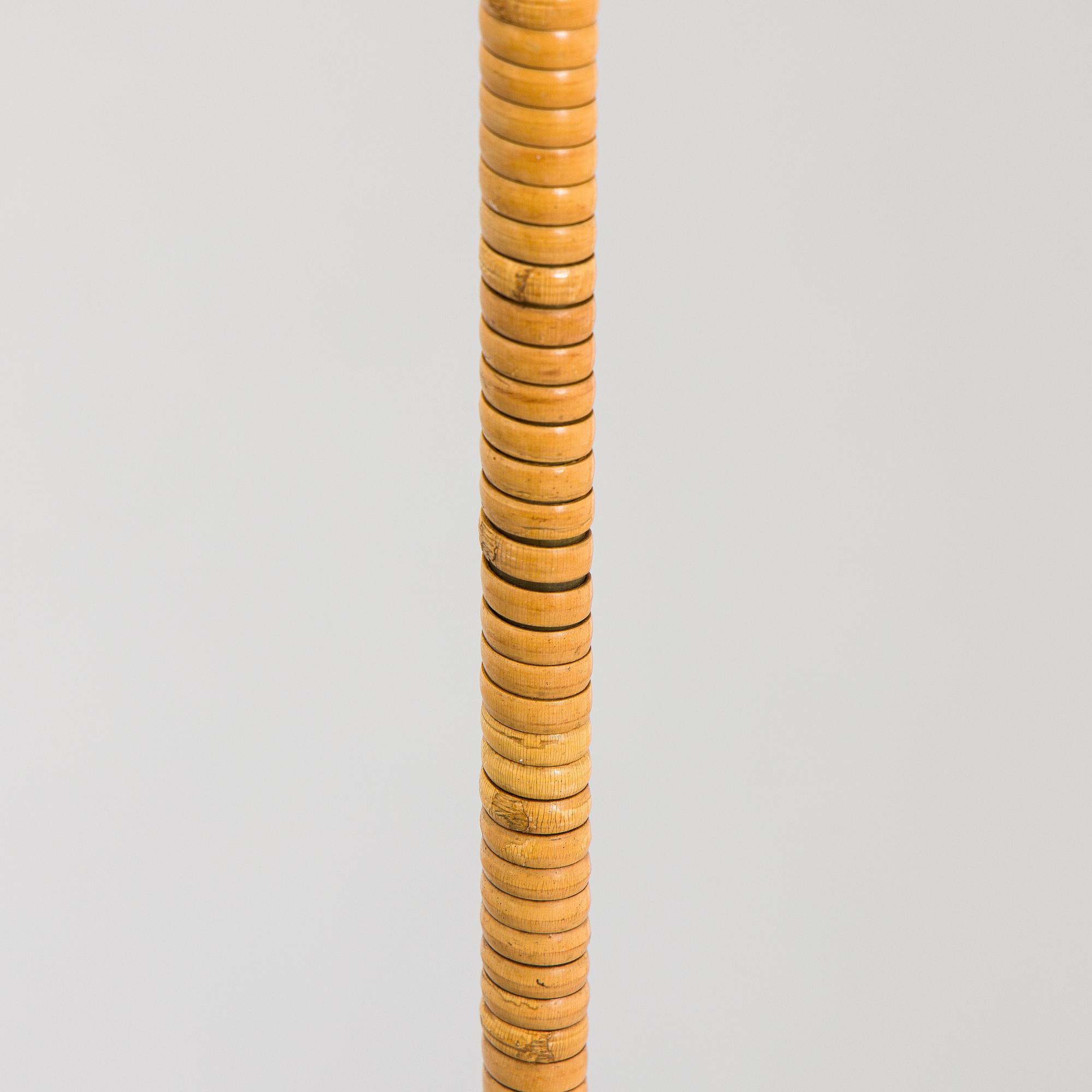 Paavo Tynell, a pair of mid-20th century K10-10 floor lamps for Taito Finland.