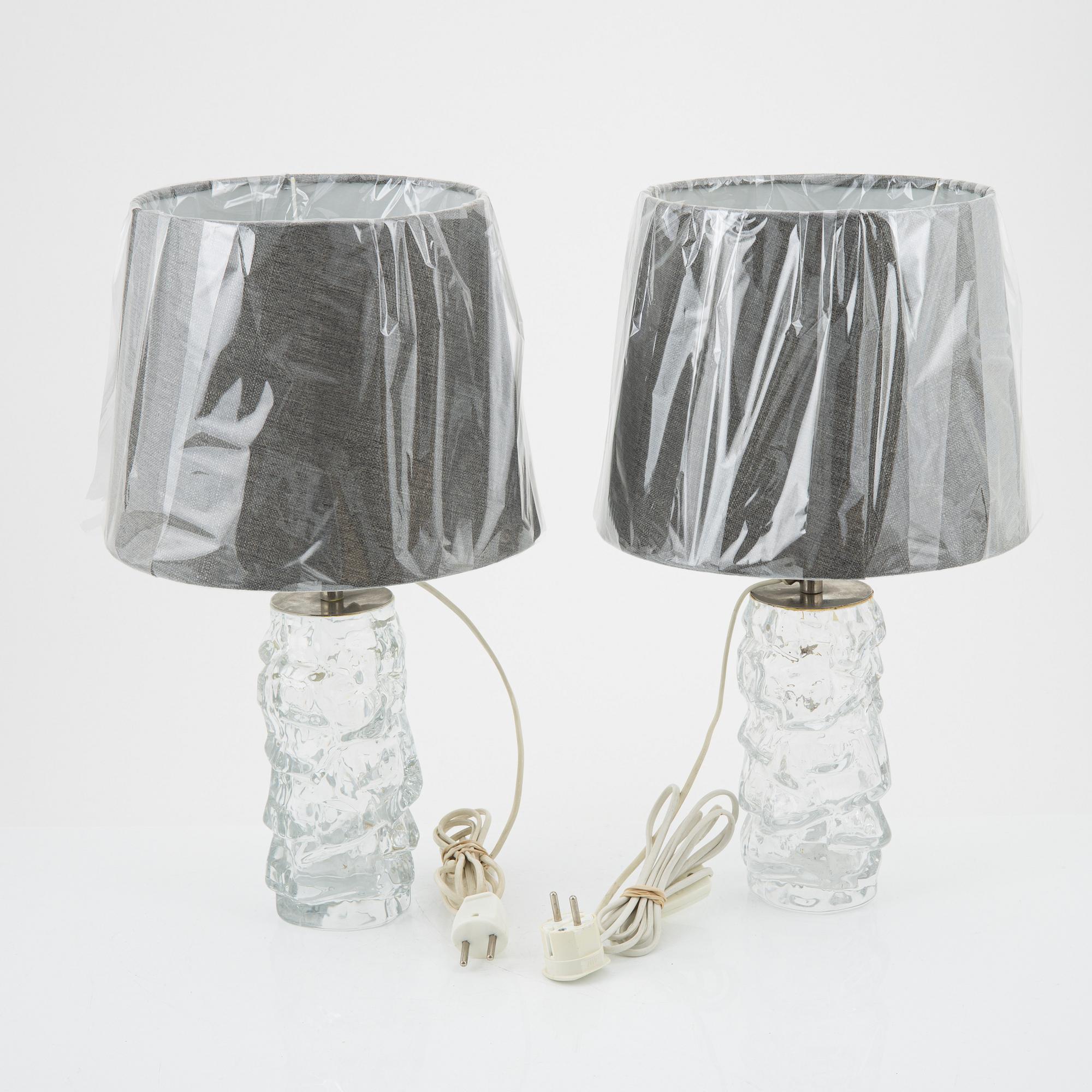 A pair of glass table lamps from Reijmyre, later part of the 20th Century.