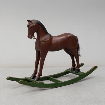 An early 20th century rocking horse.