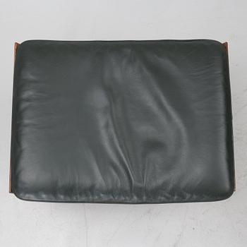 Finn Juhl, a 'Bwana' armchair and ottoman, France & Son, Denmark, 1960's.
