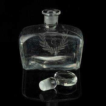 A set of 11 wine glasses and a bottle with stopper, 1900-tal.