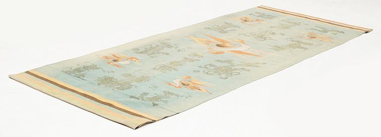 An antique Mongolian flat weave tapestry, c 285 x 120 cm (with 34 and 21 cm sewn in fabric at the ends).