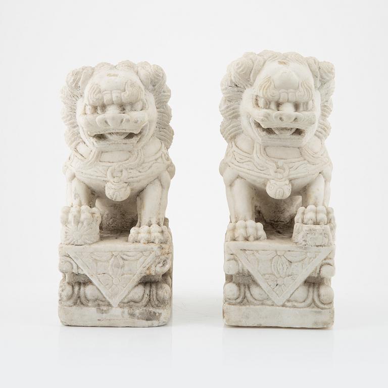 A pair of Chinese sculpture of buddhist lions, 20th Century.