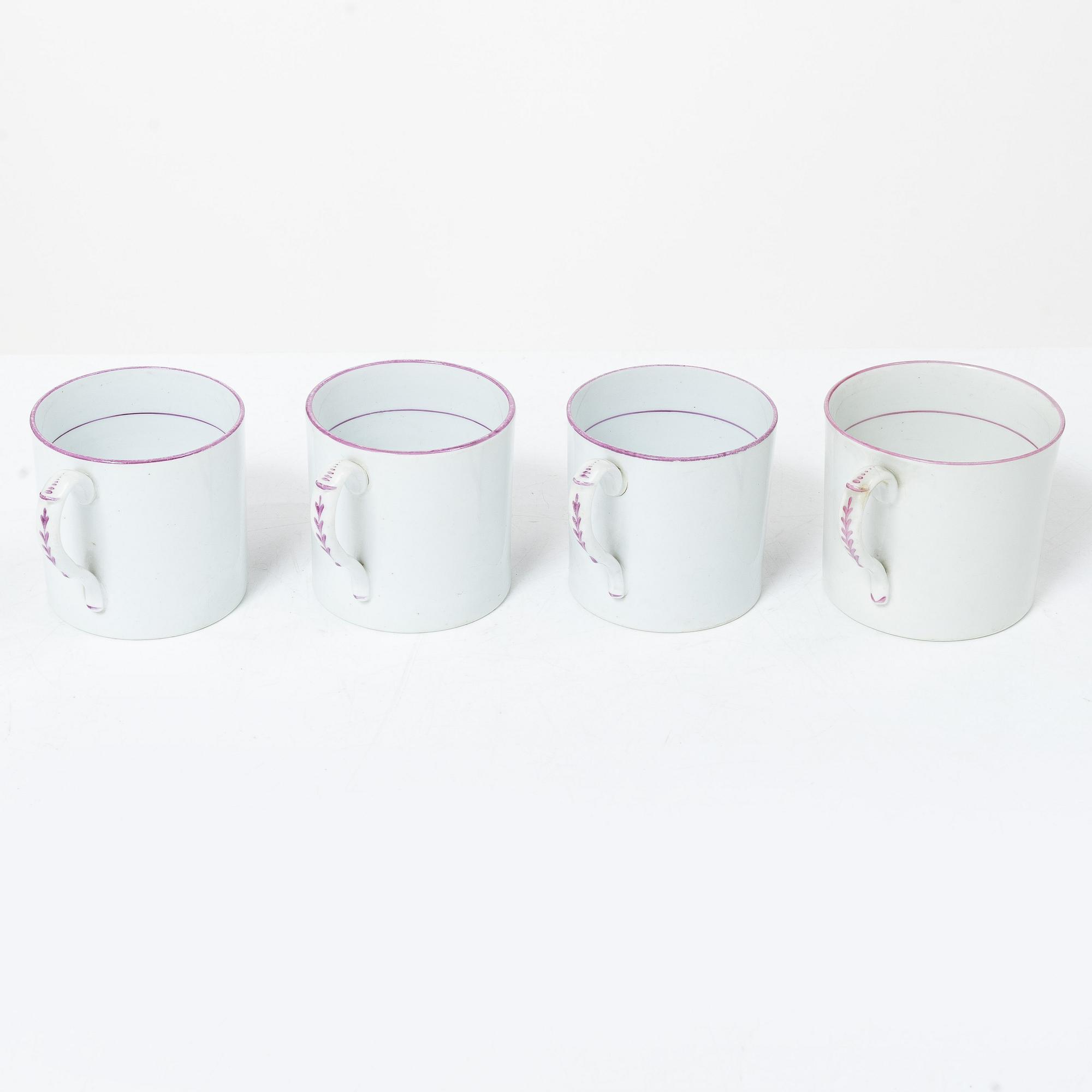 A purple camaieu part coffee service, Early 19th century.