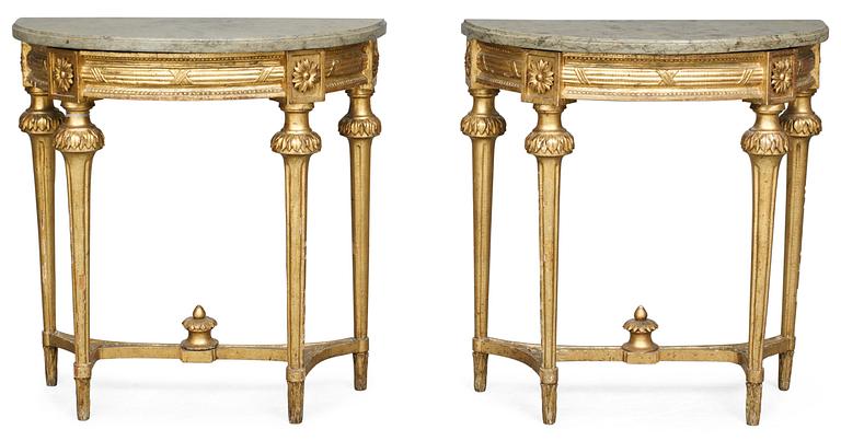 A pair of Gustavian console tables.