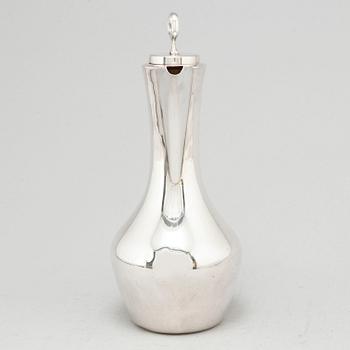 A silver claret jug from MGAB, Uppsala, 1967.