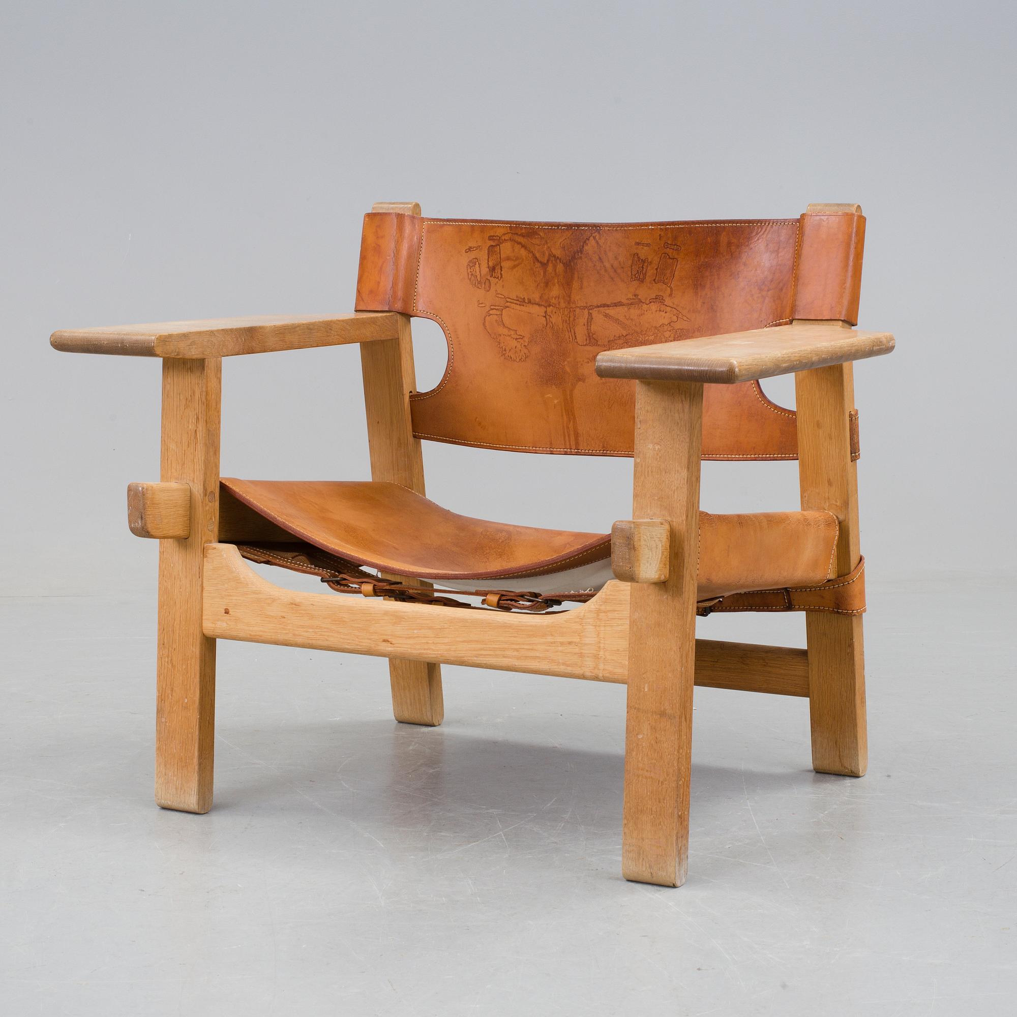 A Børge Mogensen oak and leather 'Spanish Chair' by Fredericia Stolefabrik, Denmark.
