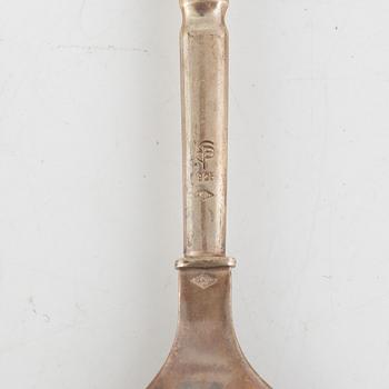 Skålar, bägare, bestick, gräddkanna samt ljusstake, 11 delar, silver. Bl a K Anderson, Stockholm 1923.