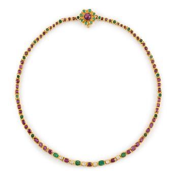 610. An Andrew Grima necklace in 18K gold set with round brilliant-cut diamonds as well as rubies and emeralds.