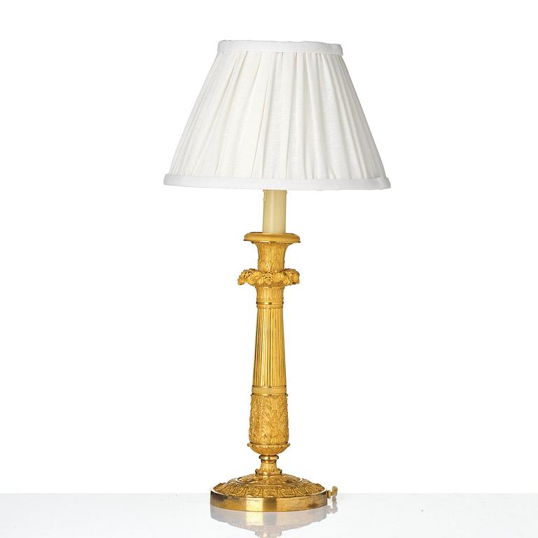 A French Empire ormolu bronze table lamp, early 19th century.