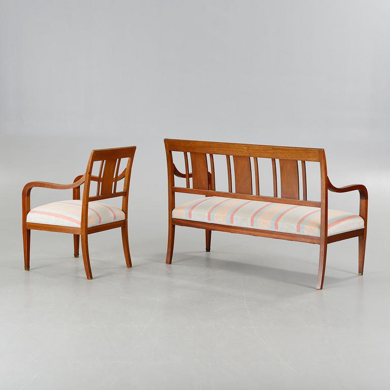 A sofa, six chairs and one table in Swedish Karl-Johan style, made in the first half of the 20th century.