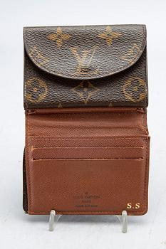 An 'Helene' wallet by Louis Vuitton.