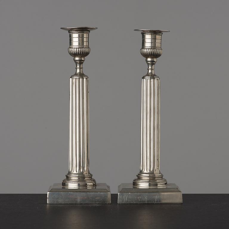 A pair of Gustavian white metal candlesticks by Isak Gråsten (1770-1821), Wedevågs Bruk.