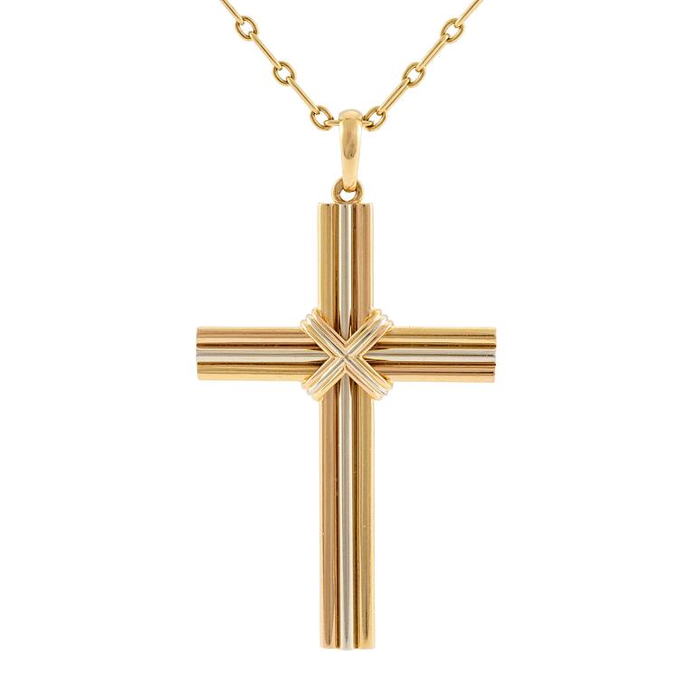 A Cartier necklace 18K multi-coloured gold "Trinity" cross.