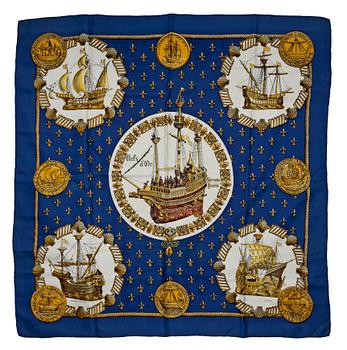 1299. A silk scarf by Hermès, "Nefs d'Or".