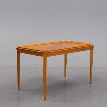 An elm Swedish Modern coffee table, dated 11 11 1947.