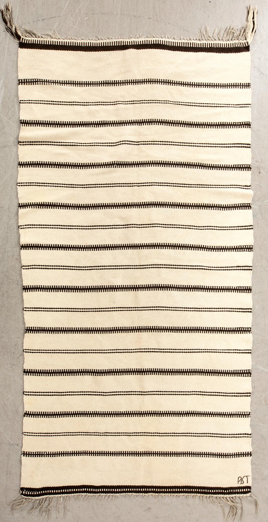 Rug, Sami, possibly from Troms Finnmark, signed AST, 230x125 cm.