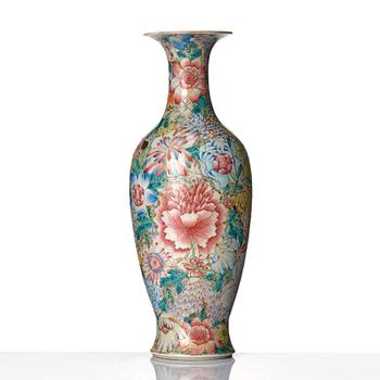 A famille rose 'mille fiori' vase, late Qing dynasty, with Qianlong mark.