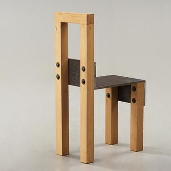 A Jonas Bohlin oak and iron chair 'Sto', executed in Stockholm in 1990,