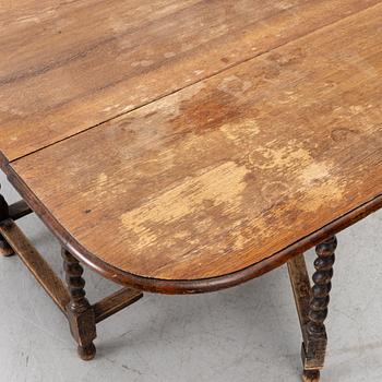 Drop-leaf table, folk art, 18th century.