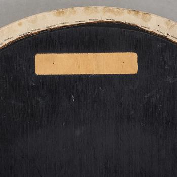 a "X600" stool by Alvar Aalto for Artek.