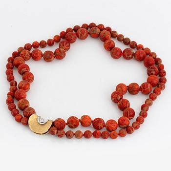 OLE LYNGGAARD, coral bead necklace, clasp with diamond.