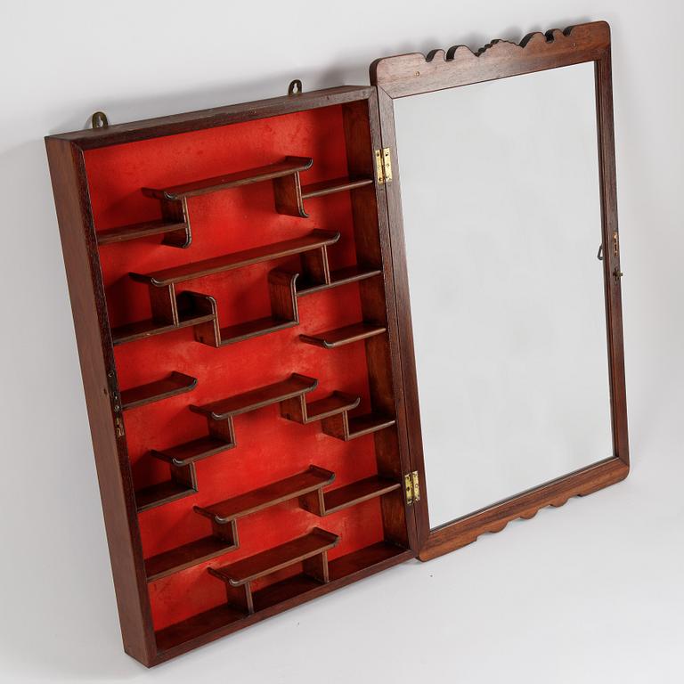 A Chinese wall display cabinet, second half of the 20th century.