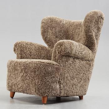 A Swedish Modern sheepskin armchair, 1940-50's.