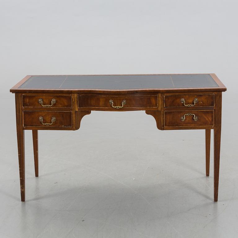 A Reprodux English writing desk.