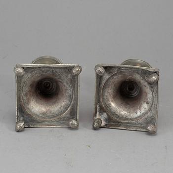 A pair of Swedish late gustavian pewter candlesticks, early 19th century.