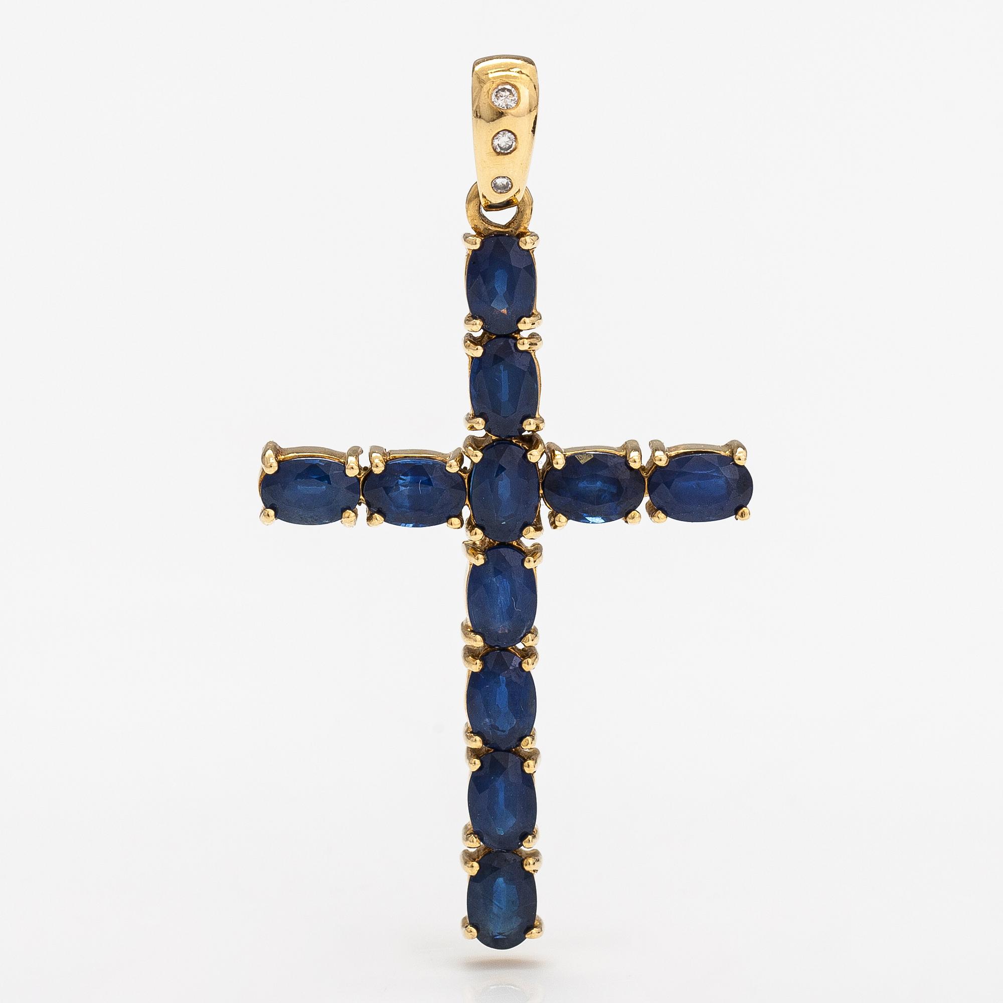 Kors, 18K guld och safirer och diamanter ca 0.035 ct tot.