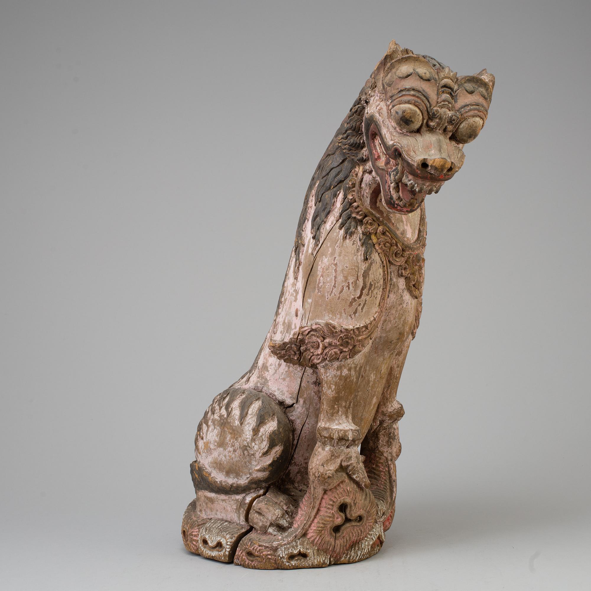 A wooden mythical beast, Southeast Asia, early 20th Century.