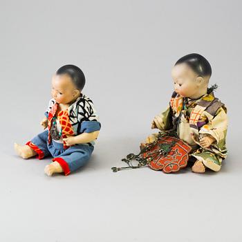 Two oriental bisque head baby dolls by Armand Marseille and Heubach Köppelsdorf, Germany, early 20th century.