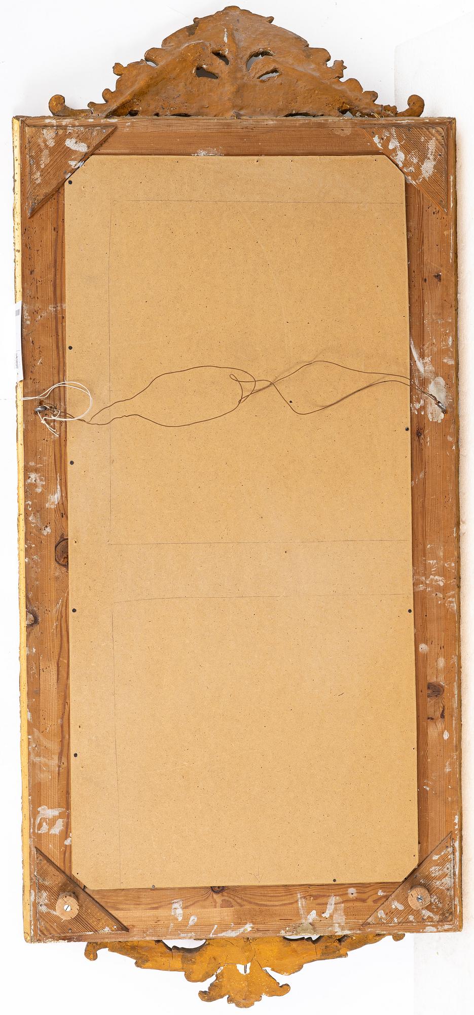 A mirror, circa 1900.
