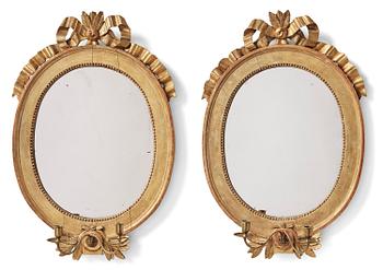 113. A pair of Gustavian giltwood two-branch girandoles by J. Åkerblad (master in Stockholm 1756-99).