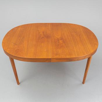 A walnut veneer table from the second half of the 20th century.