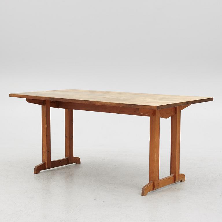 A Mid 20th Century Pinewood Dining Table.