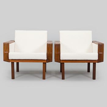 A pair of 1960s armchairs.