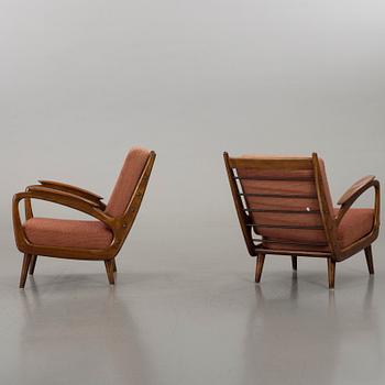 A PAIR OF EASY CHAIRS FROM THE MID 20TH CENTURY,