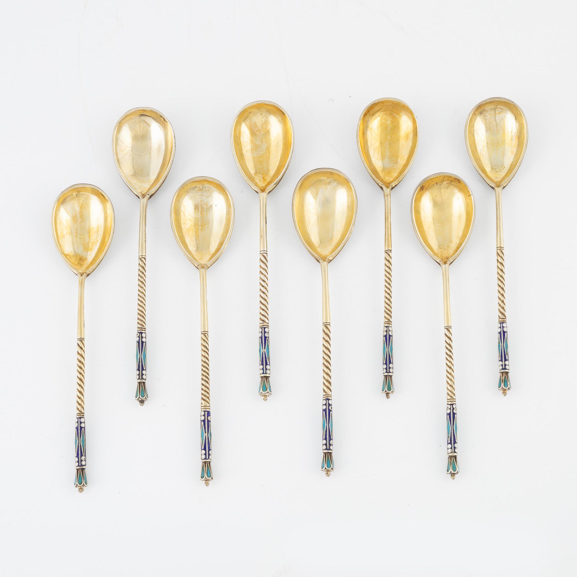 Eight Russian gilded silver and enamel spoons, Moscow, 1896-1908.