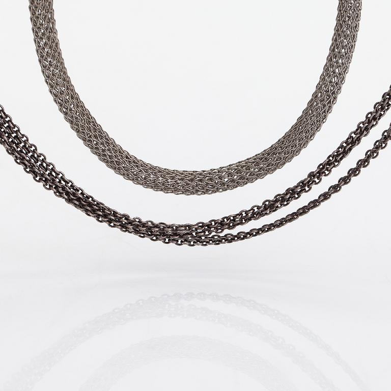Ole Lynggaard A set of two sterling silver necklaces. Denmark.