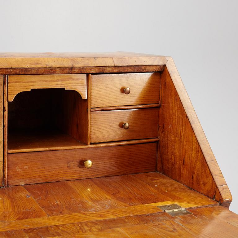 A Gustavian elm-veneered secretaire, late 18th century.