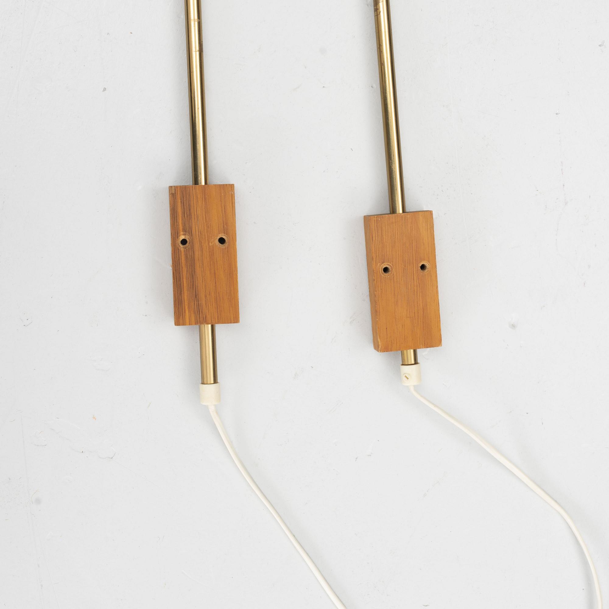 Eje Ahlgren, A pair of brass wall lights, "V-75", Bergboms.