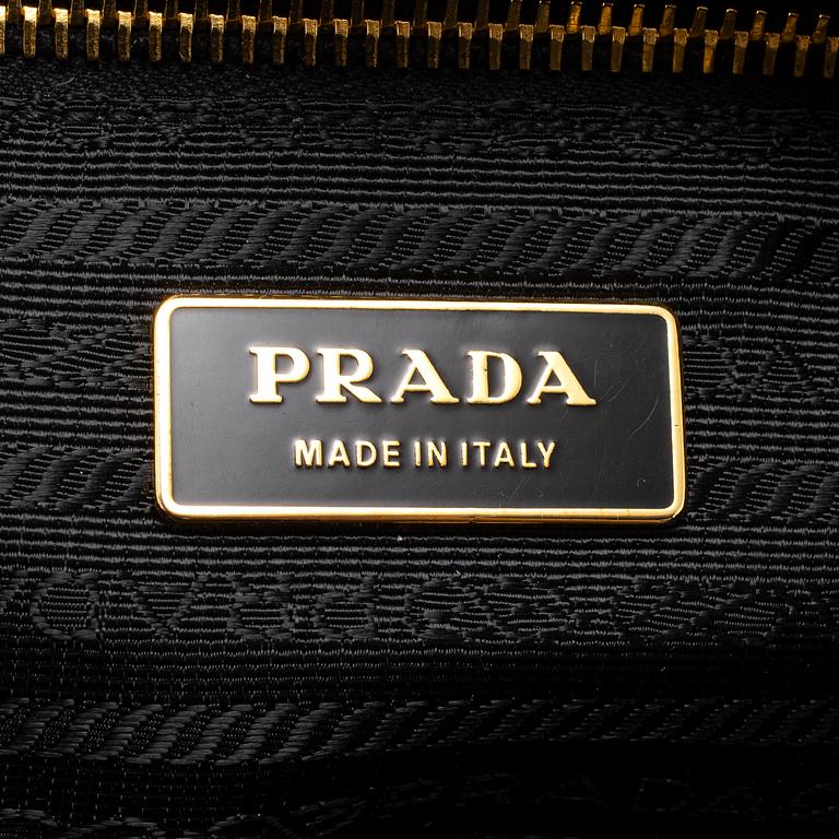 PRADA, black leather bag.