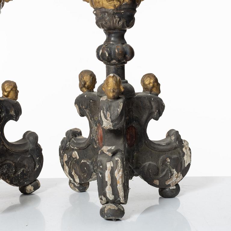 A pair of Baroque style candleholders, 19th Century.